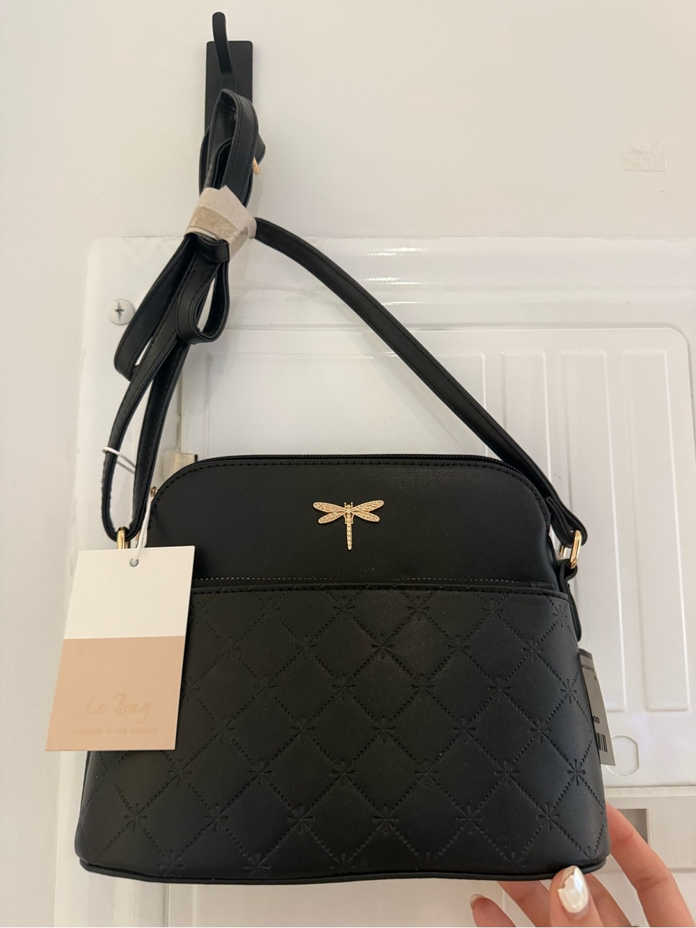 Black Quilted Crossbody Bag with Gold Dragonfly Accent